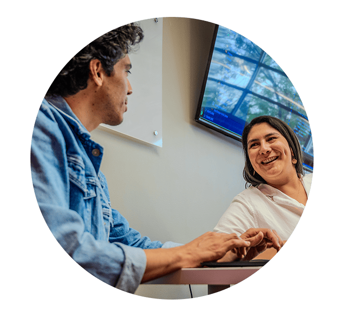 Man and woman sitting together smiling